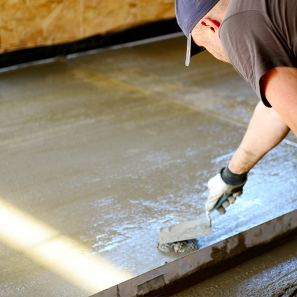 Concrete SuppliesConcrete being leveled.